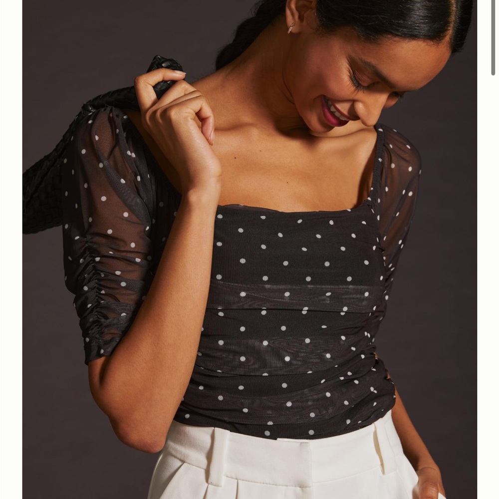 Anthropologie black polka dot top